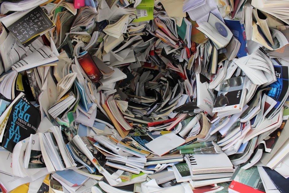 Chaotic pile of books representing information overload that AI summarizers help manage