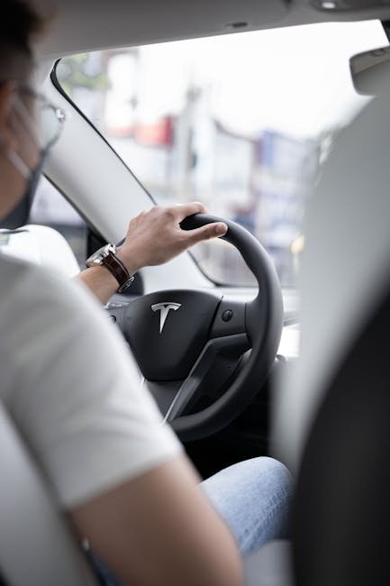 Tesla Robotaxi Goes Driverless: 4 Things to Know About Empty Cars in Austin 1 Tesla robotaxi interior dashboard and steering wheel showing autonomous driving technology