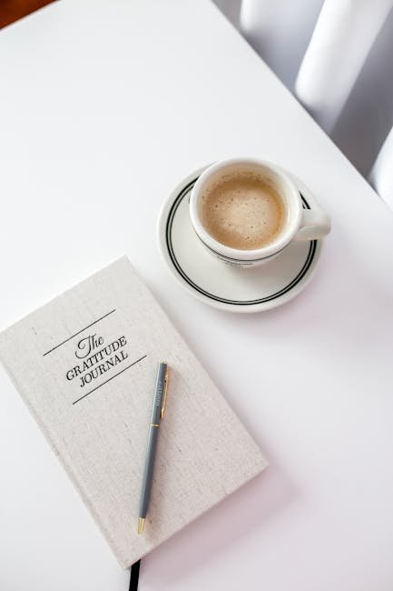AI mood tracking journal beside a cup of coffee on a bright, minimalist table setting