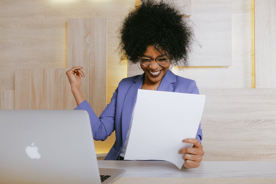Woman celebrating success after efficiently processing documents with AI summarizer