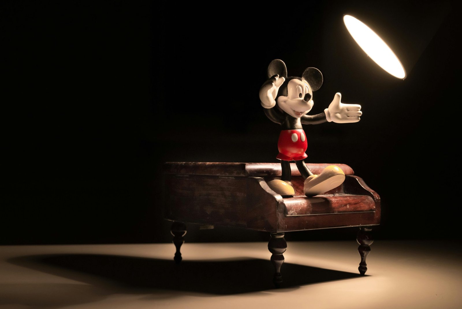Disney Sora Partnership: 5 Essential Things You Need to Know About the $1B Deal 1 Disney Sora partnership - Mickey Mouse figurine representing the OpenAI deal