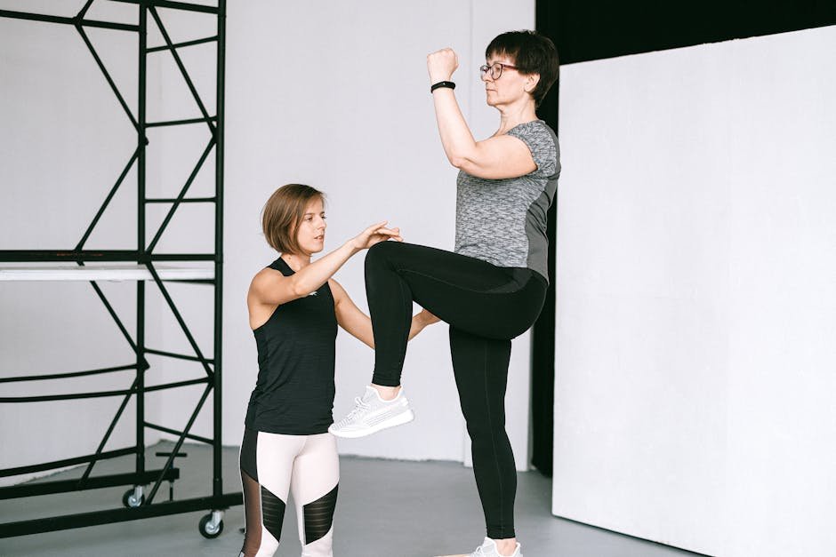 How AI Can Improve Your Life in 2026: Part 14 - Get Real-Time AI Fitness Coaching 3 An elderly woman performs exercises with a fitness coach focusing on healthy lifestyle