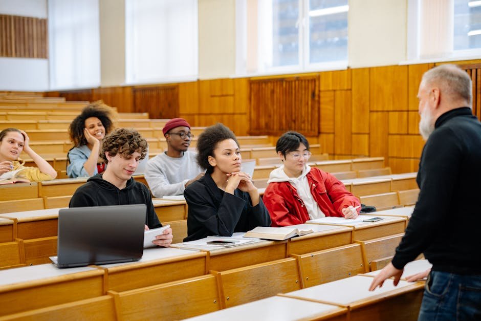 Students from diverse backgrounds engaged in a university lecture, representing AI education in higher education