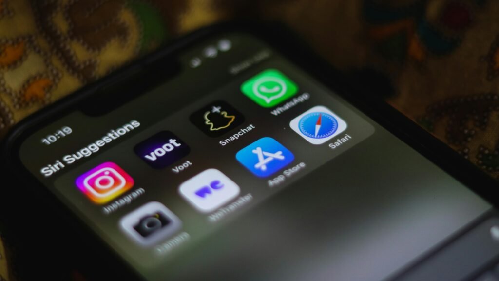 Apple Siri Gemini Deal: What the $1 Billion Google Partnership Means for Your iPhone 1 Detailed view of a smartphone home screen displaying various social media and utility apps.