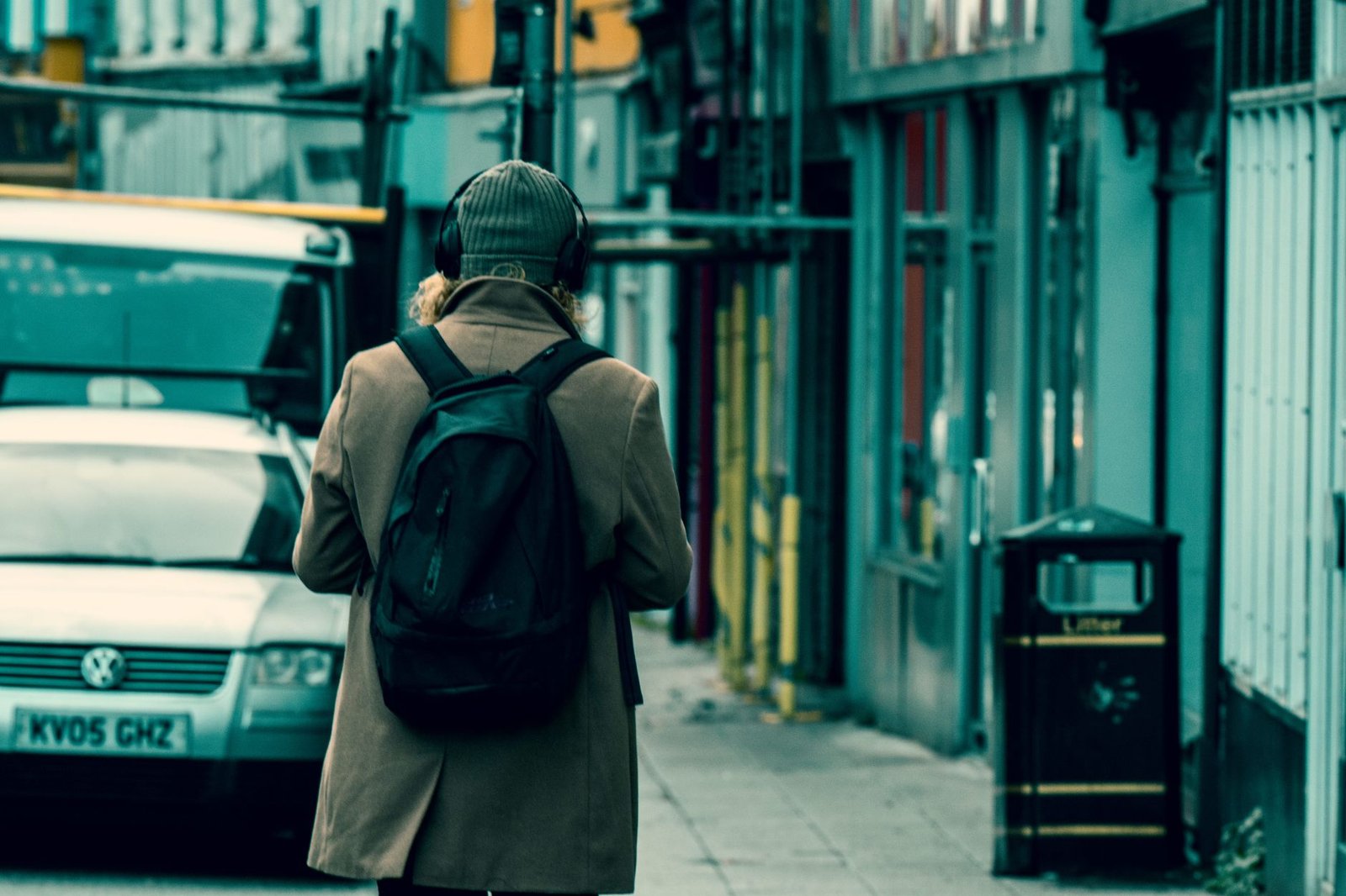 ChatGPT Can Finally Handle Being Interrupted. What GPT-Live Changes for You. 1 A person walking down a city street wearing headphones, talking hands-free with GPT-Live
