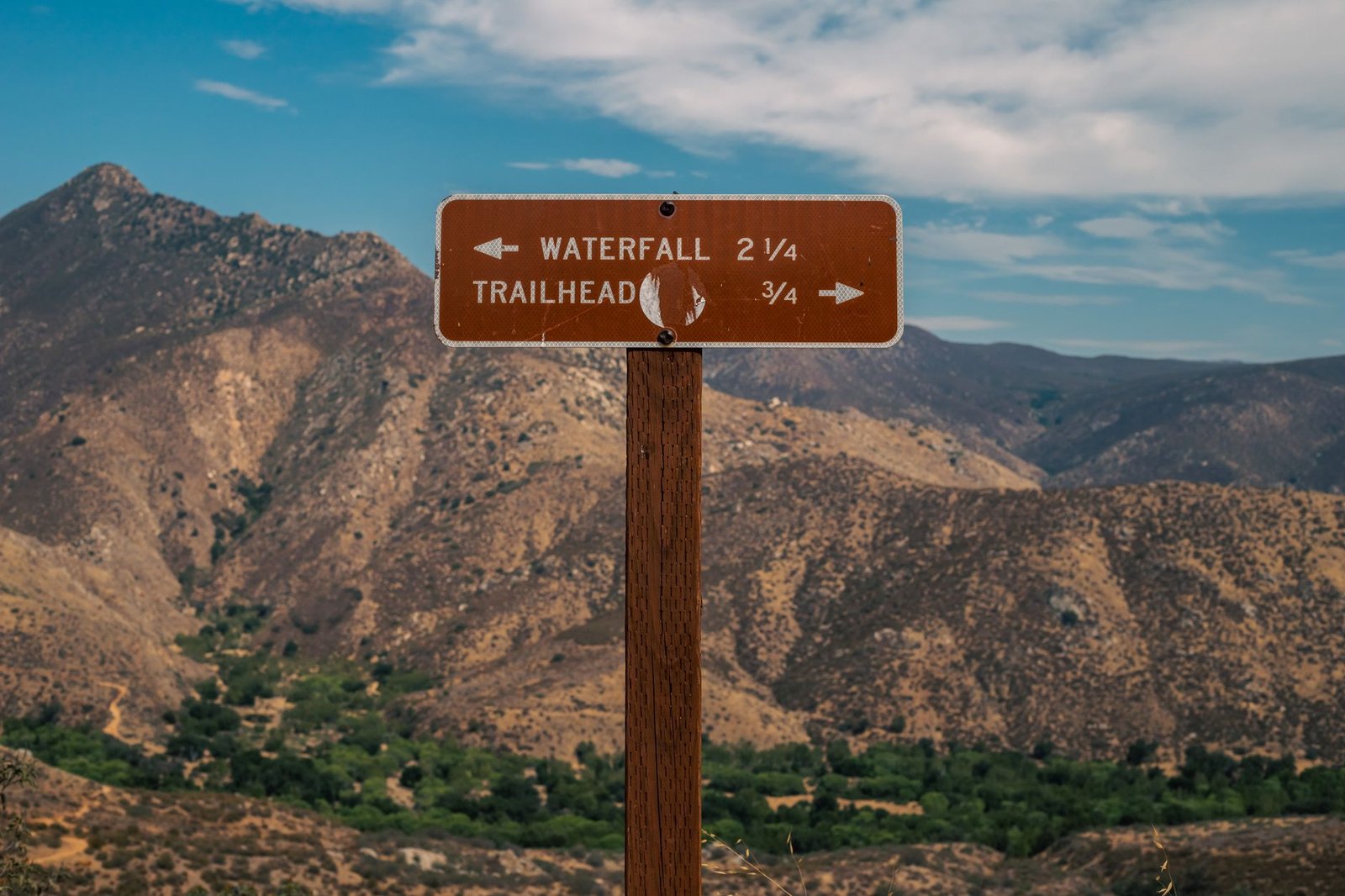 AI Presentation Maker Showdown: Gamma vs Canva vs Beautiful.ai 5 Wooden signpost showing trail directions, choosing which tool to use