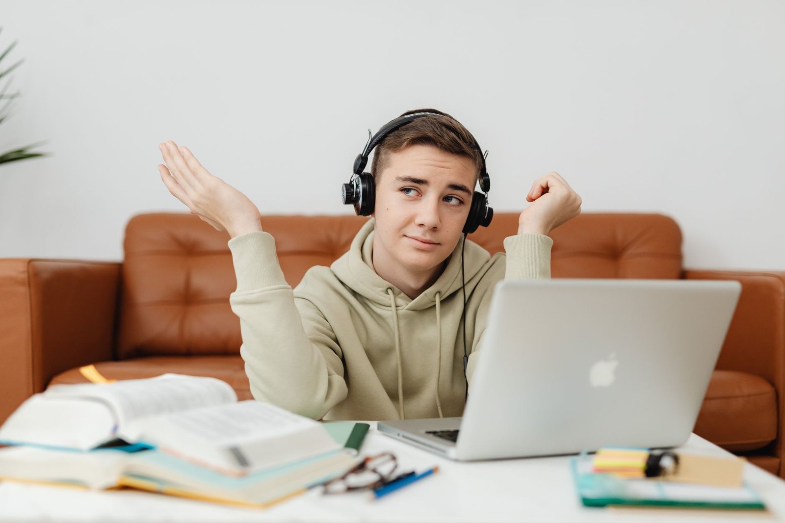 Gemini Study Notebooks: How Google's Free AI Tutor Actually Works 2 Person using Gemini Study Notebooks for online learning on a laptop at home