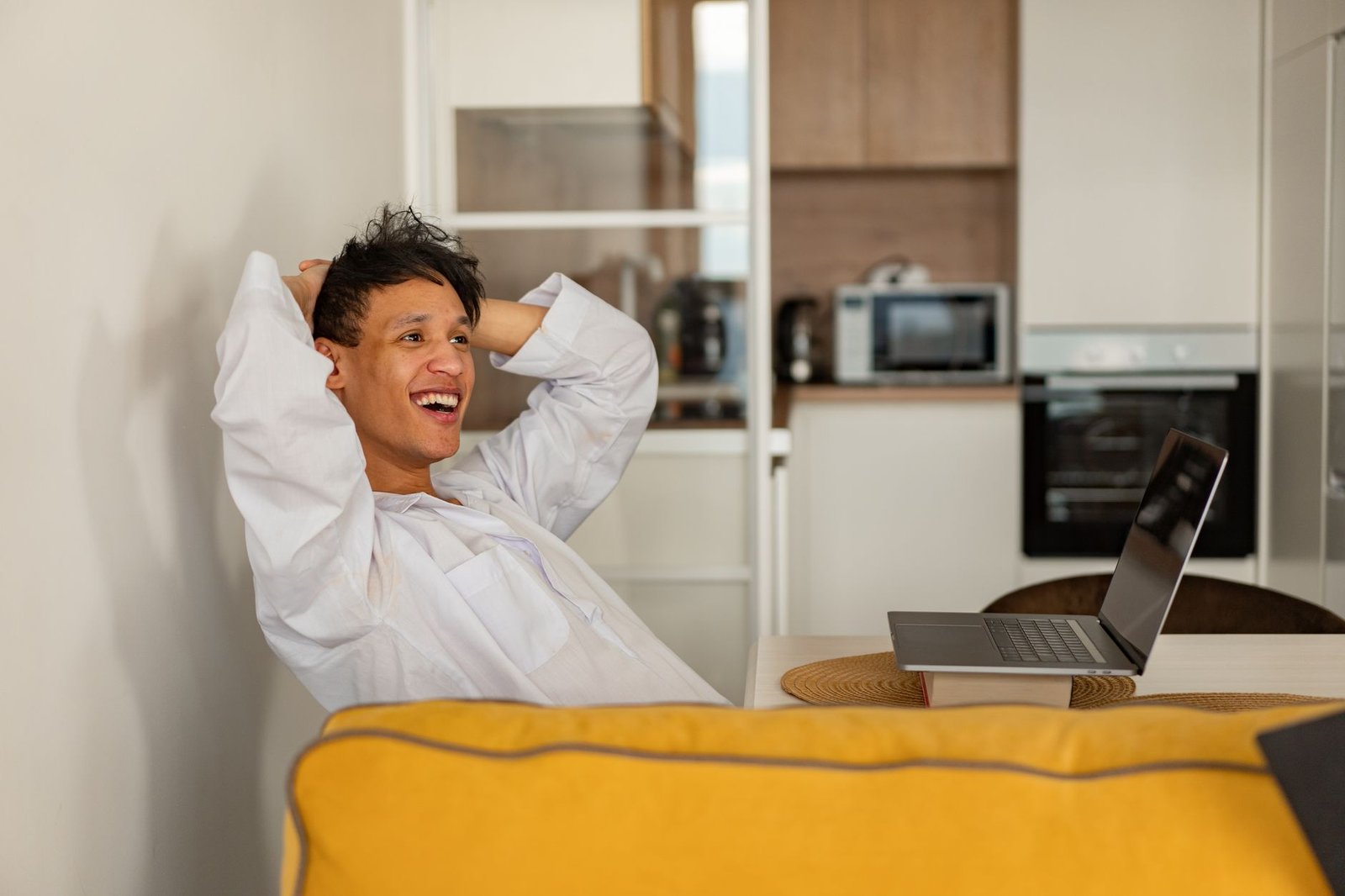 ChatGPT Memory Now Builds a Profile of You: Why I Don't Mind 2 A relaxed person working on a laptop at home, not having to re-explain themselves thanks to ChatGPT memory