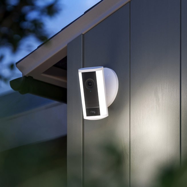 Ring AI Features in 2026: Smarter Alerts and My Honest Take 3 An outdoor security camera on a wall, the kind that can now deliver Ring Active Warnings automatically
