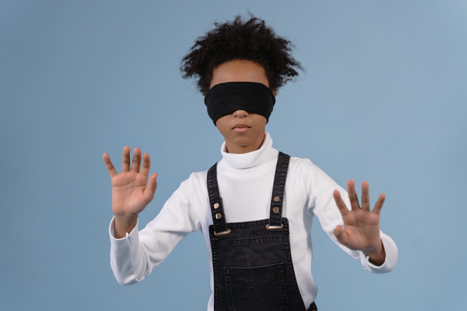 Blindfolded person representing readers who could not tell AI-written stories from human fiction