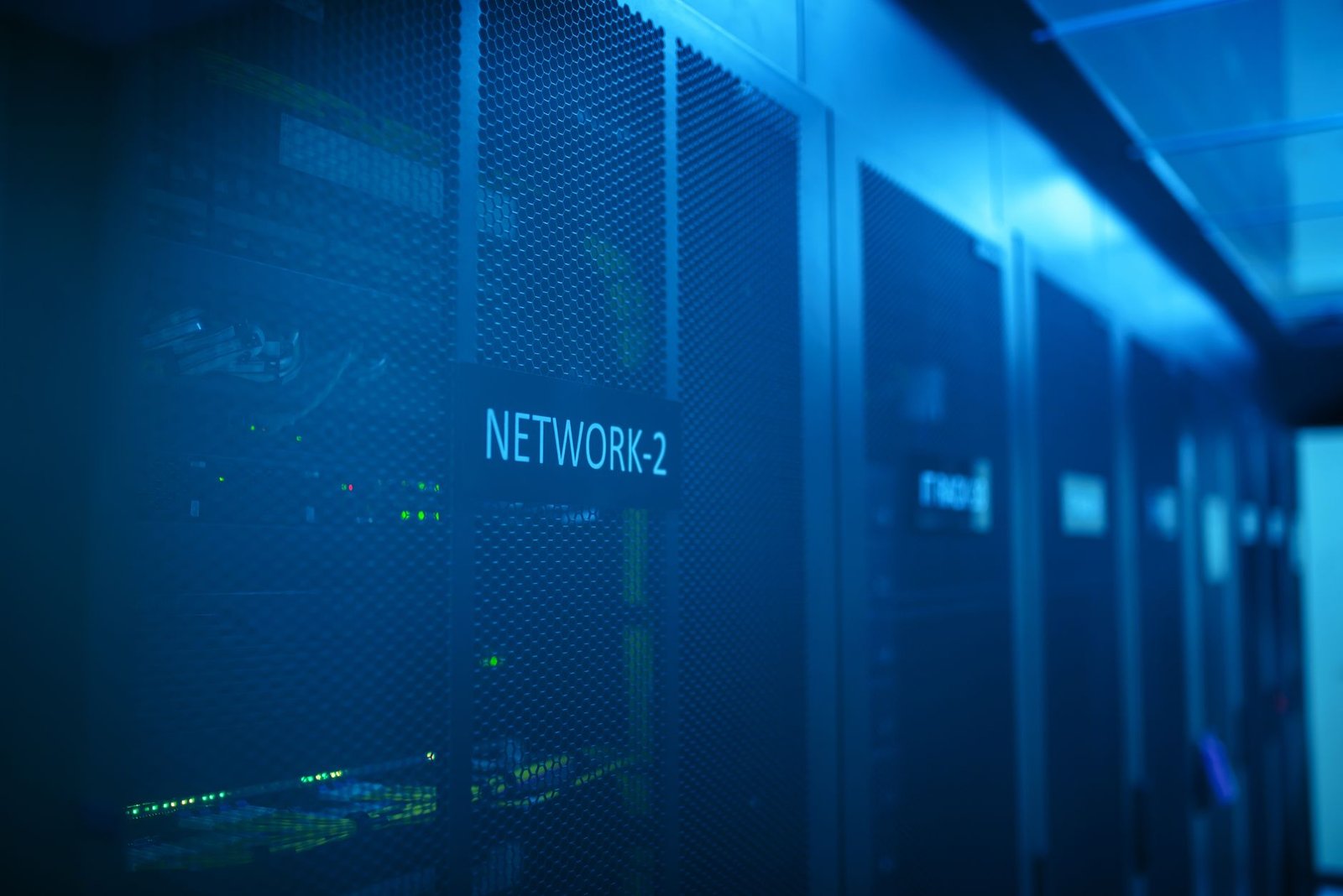 A server room lit in blue, the kind of system behind the 2026 breach numbers