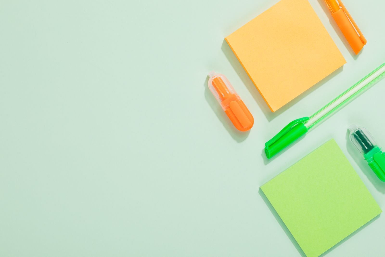Gemini in Classroom Just Opened to K-12. There's No Parent Off Switch. 3 Sticky notes and highlighters on a desk, the kind of material Gemini in Classroom turns into flashcards and quizzes