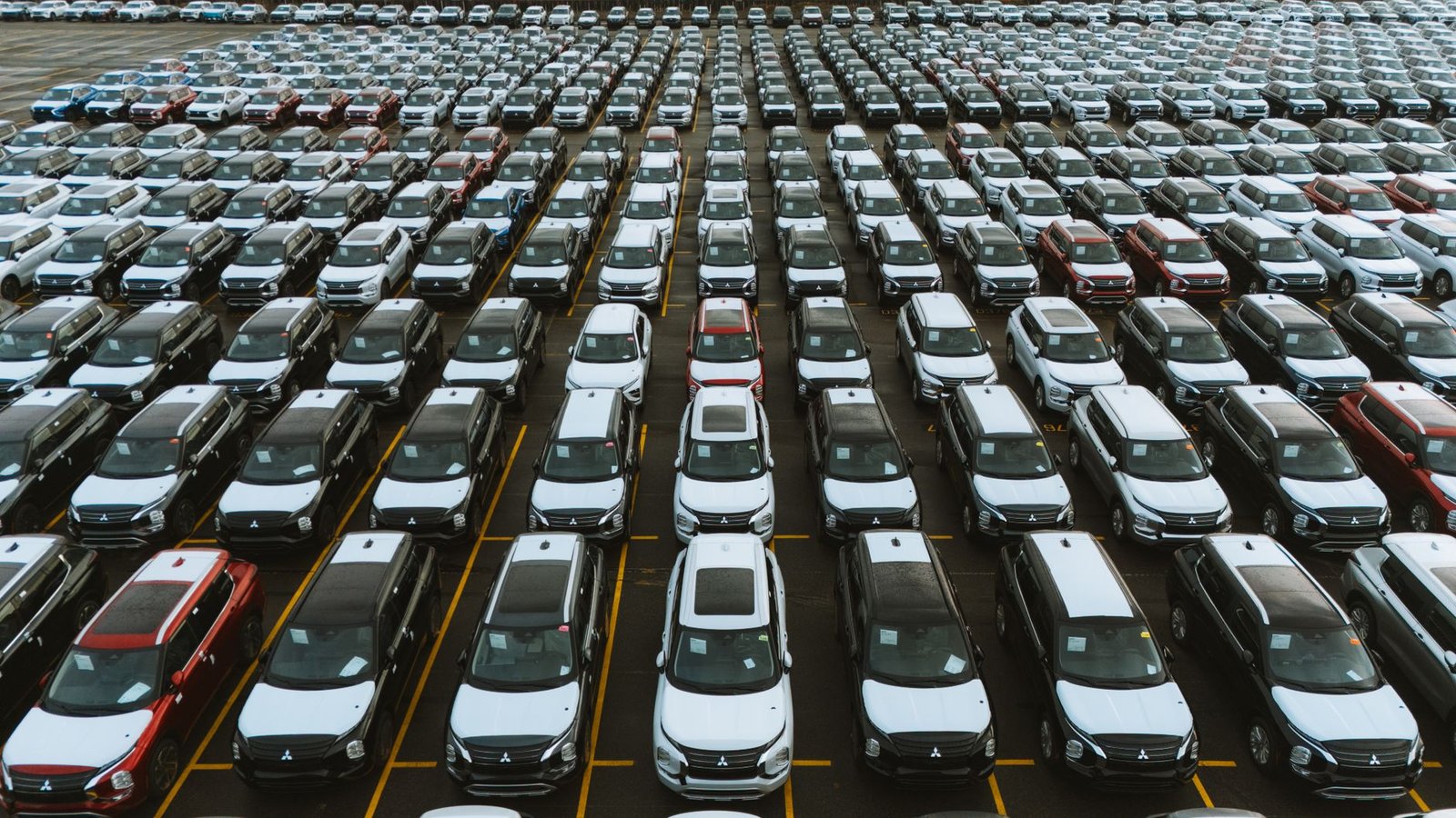 GPU Prices in 2026: AI Just Doubled the Cost of Your Next PC 3 Rows of cars in a storage lot, a flashback to the pandemic chip shortage that hit car prices