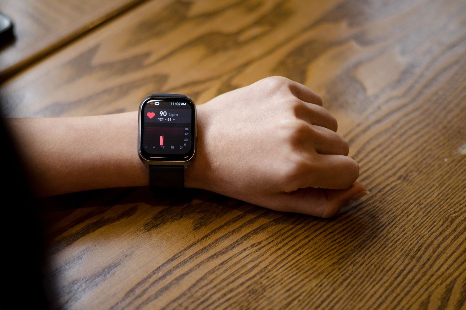A smartwatch showing a heart rate reading, the Apple Health data you can connect to ChatGPT Health