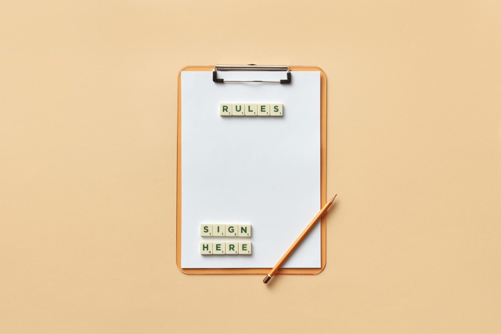 A clipboard with letter tiles spelling rules and sign here, like the custom rules you set for a ChatGPT dot