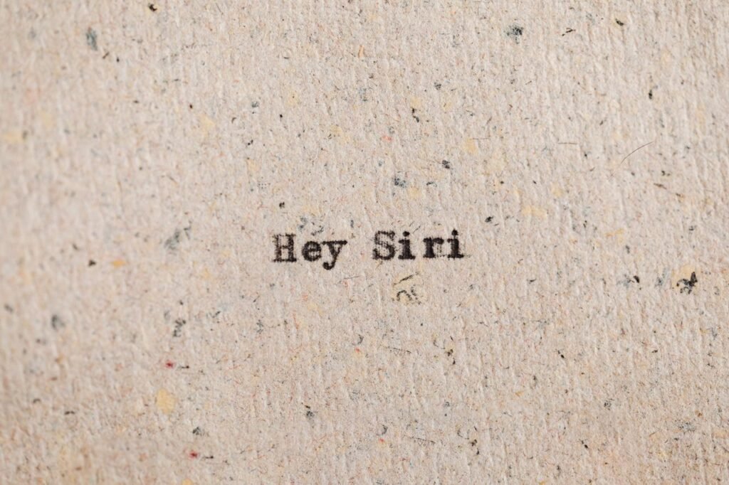 How to Turn Off Siri AI and Get Siri Classic Back in iOS 27 2 Close-up view of 'Hey Siri' text printed on recycled paper, conceptual art.
